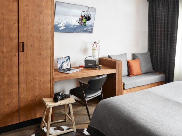 Ecrin Blanc Resort Courchevel - Aquapark : photo 2 de la chambre chambre cocoon avec accès au parc aquatique