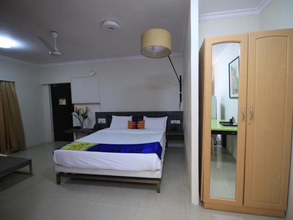 Landmark Suites Bollywood design Hotel : photo 1 de la chambre chambre familiale