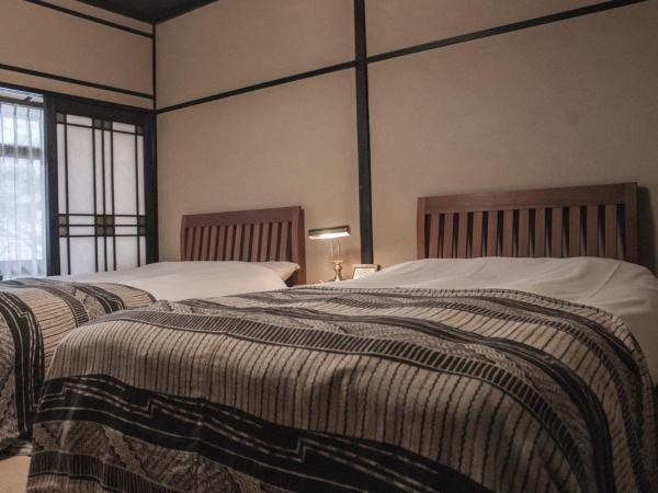 Arima Onsen Tocen Goshobo : photo 1 de la chambre chambre lits jumeaux Économique occidentale de style japonais avec salle de bains commune - « chikyu »