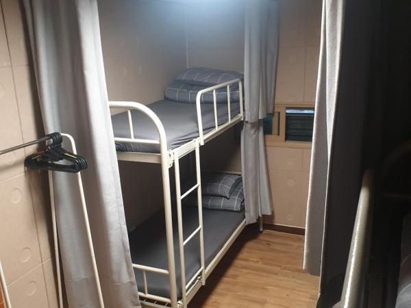 Family House Hongdae : photo 2 de la chambre lit dans dortoir pour femmes de 6 lits