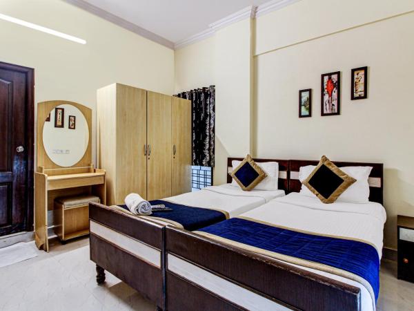 NirmalVilla Cherry : photo 1 de la chambre chambre double deluxe (2 adultes + 1 enfant)