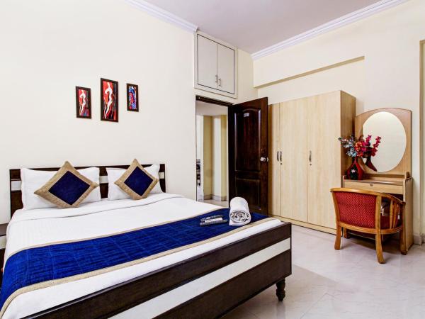 NirmalVilla Cherry : photo 2 de la chambre chambre double deluxe (2 adultes + 1 enfant)