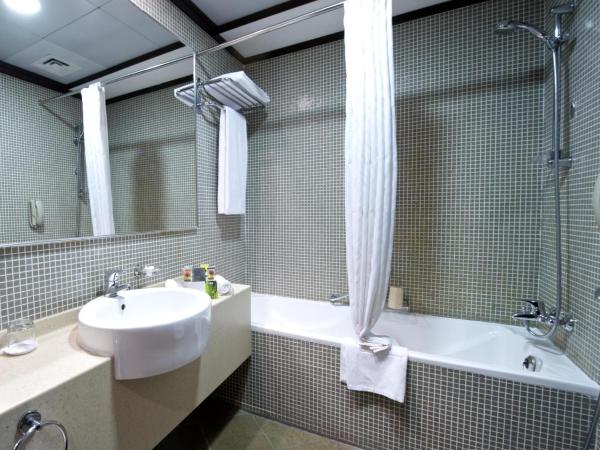 TIME Oak Hotel & Suites : photo 2 de la chambre chambre lit king-size exécutive