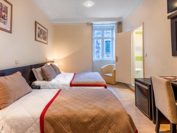 Hotel do Norte : photo 4 de la chambre chambre double avec lit d'appoint