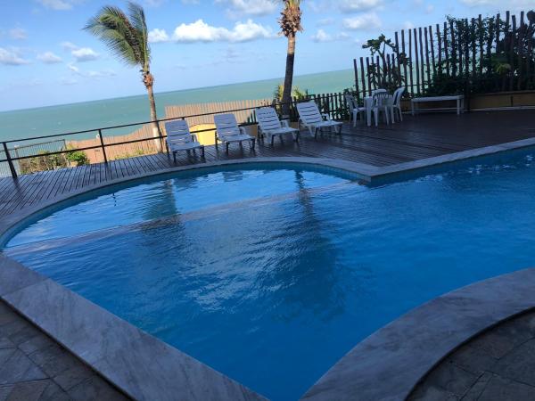 Atlântico Flat ap 204 em Ponta Negra : photo 4 de la chambre chambre double ou lits jumeaux - vue partielle sur mer