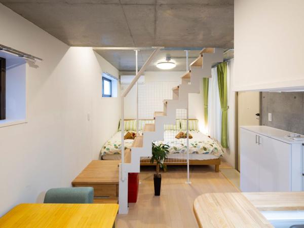 Laffitte Hirai Condominium Hotel : photo 1 de la chambre appartement en duplex