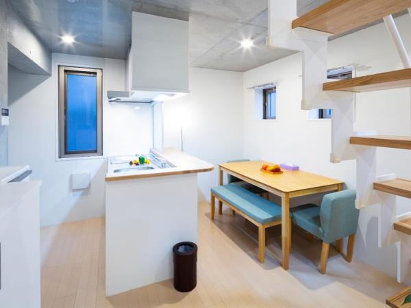 Laffitte Hirai Condominium Hotel : photo 10 de la chambre appartement en duplex