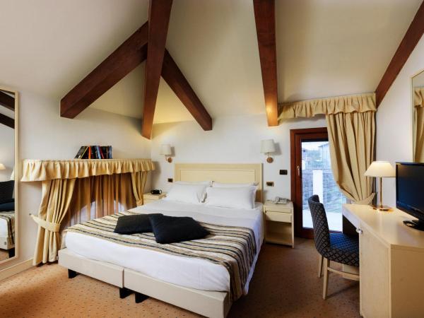 Hotel Giudecca Venezia : photo 1 de la chambre chambre double ou lits jumeaux supérieure
