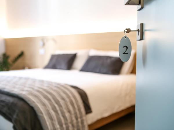 Bed and Bike Verona : photo 2 de la chambre chambre double ou lits jumeaux deluxe – vue sur jardin