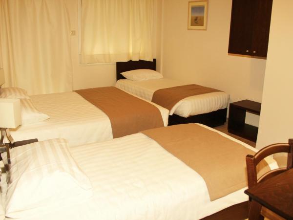 Rea Hotel : photo 2 de la chambre chambre quadruple Économique