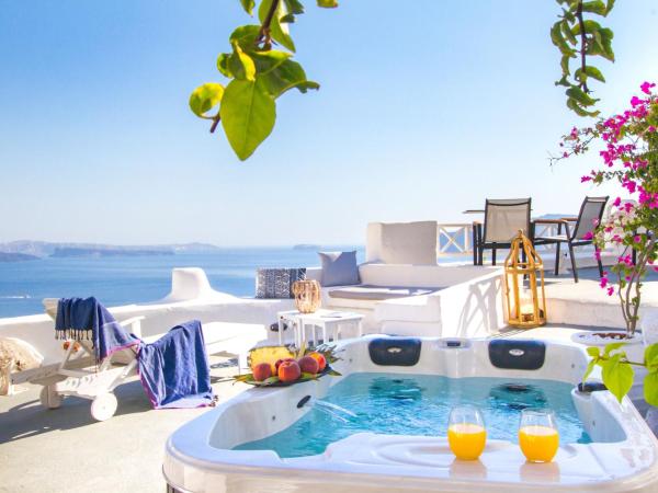 Alexander's Suites : photo 1 de la chambre suite supérieure avec jacuzzi - vue sur caldera