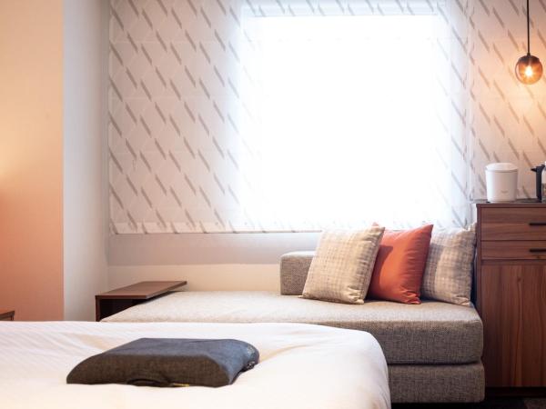 HOTEL FORZA HAKATAEKI CHIKUSHIGUCHI Ⅱ : photo 9 de la chambre deluxe twin room with two double beds(2 adult) - non-smoking