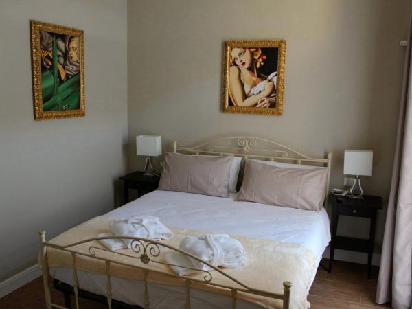 Casa Aydée : photo 1 de la chambre chambre double avec salle de bains privative