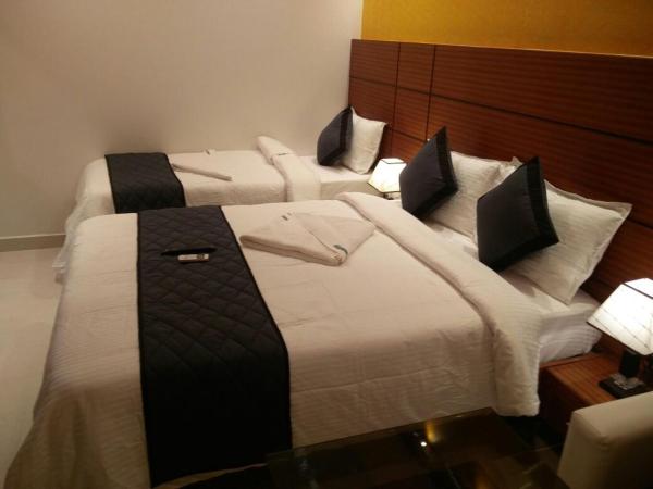 HOTEL SPARK RESIDENCY : photo 6 de la chambre chambre triple de luxe