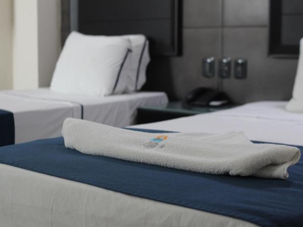 Hotel Portonovo Plaza Malecon : photo 6 de la chambre chambre standard