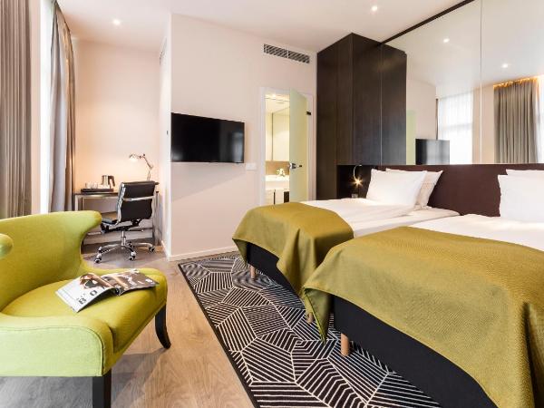 Holiday Inn Dresden - Am Zwinger, an IHG Hotel : photo 3 de la chambre chambre lits jumeaux premium - vue sur ville