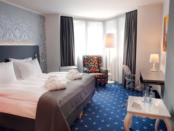 Holiday Inn Dresden - City South, an IHG Hotel : photo 10 de la chambre chambre lit king-size exécutive