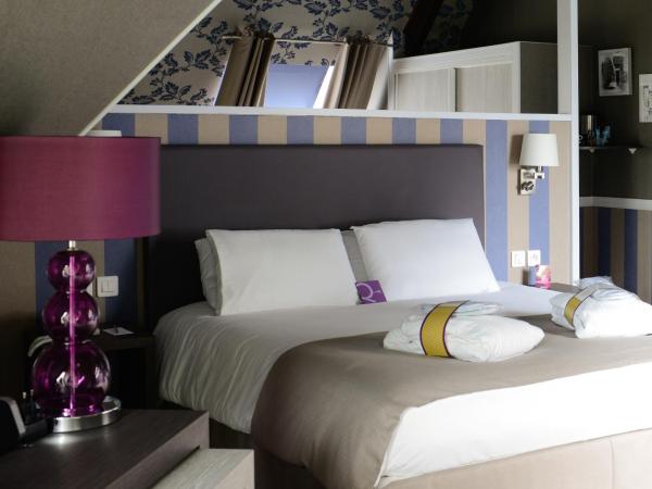 Mercure Cabourg Hôtel & Spa : photo 5 de la chambre suite privilège avec 1 lit double et 1 canapé-lit