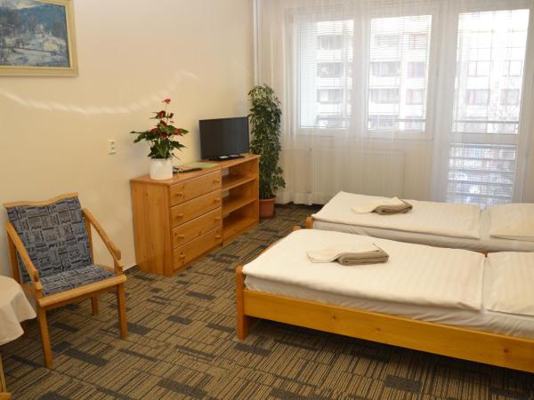 Volha : photo 2 de la chambre chambre lits jumeaux avec salle de bains commune