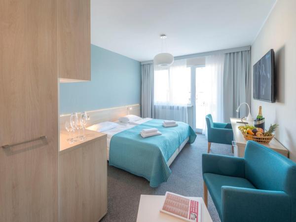 Apartamenty Nad Parsętą Szpitalna 7 : photo 5 de la chambre chambre double ou lits jumeaux