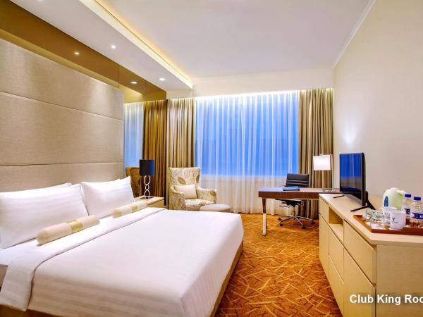 Menara Peninsula Hotel : photo 1 de la chambre grande chambre double 