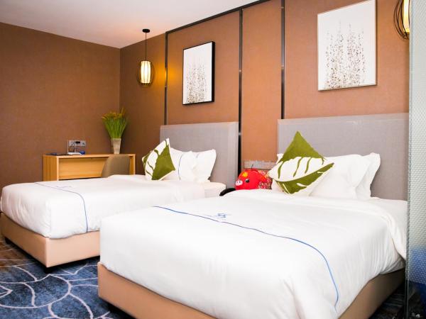 Guangzhou Homies Hotel : photo 5 de la chambre chambre lits jumeaux deluxe