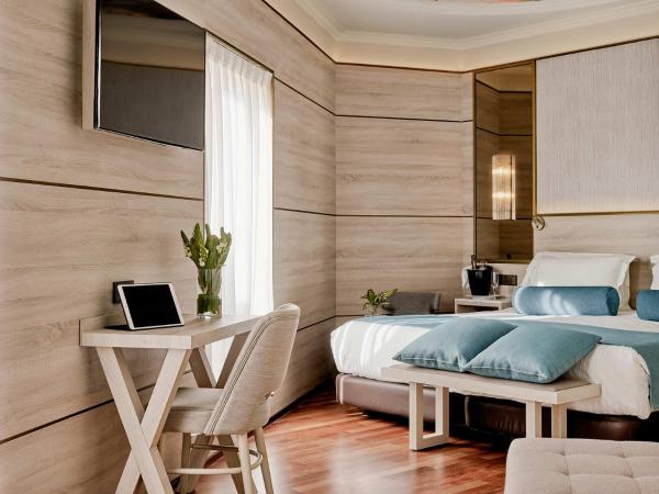 Preciados : photo 1 de la chambre chambre double ou lits jumeaux supérieure avec terrasse