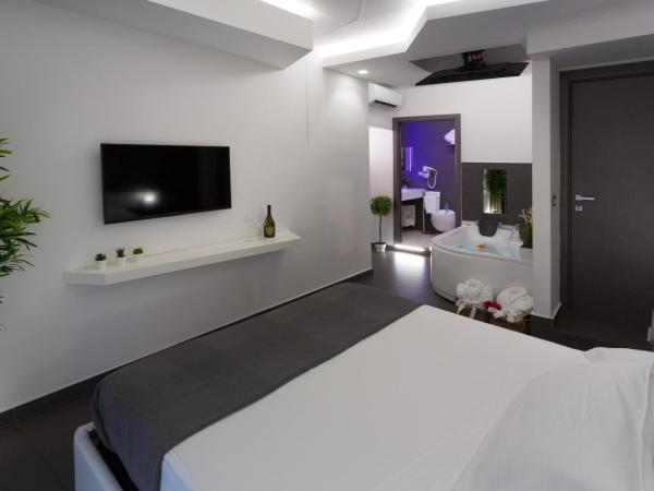Le Suites Del Duomo : photo 10 de la chambre chambre lit queen-size avec baignoire spa