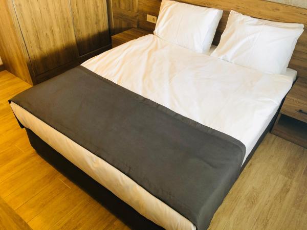 Golden World Suite Hotel : photo 10 de la chambre suite lit queen-size