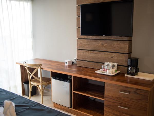 Hotel Clipperton : photo 6 de la chambre chambre lit king-size deluxe avec canapé-lit