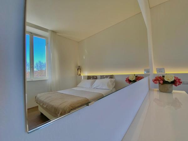 Soggiorno Lo Stellino : photo 7 de la chambre chambre double - vue sur jardin