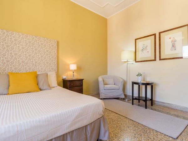 Al Porto Di Cagliari : photo 1 de la chambre grande chambre double ou lits jumeaux