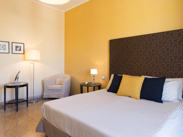 Al Porto Di Cagliari : photo 3 de la chambre grande chambre double ou lits jumeaux