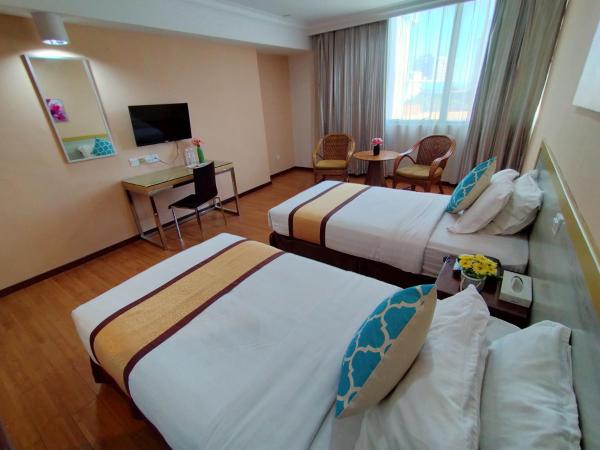 TD Plaza Hotel : photo 2 de la chambre chambre lits jumeaux deluxe