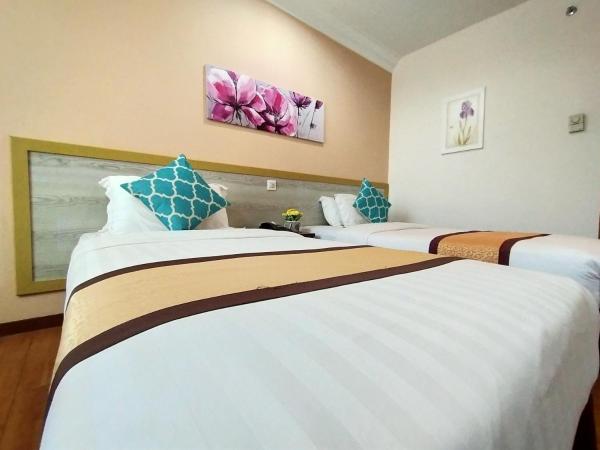 TD Plaza Hotel : photo 4 de la chambre chambre lits jumeaux deluxe