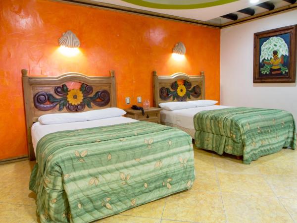 Suites Flamboyanes : photo 2 de la chambre chambre double avec kitchenette
