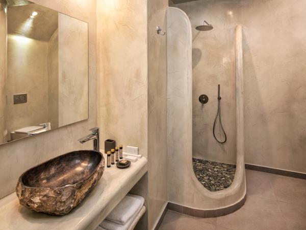 Abasa Suites : photo 8 de la chambre suite supérieure avec bain à remous extérieur