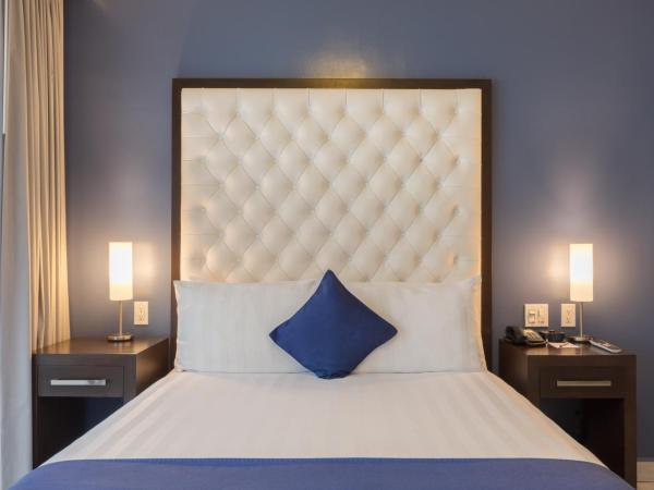 Medano Hotel and Spa : photo 1 de la chambre chambre de luxe avec 1 lit queen-size