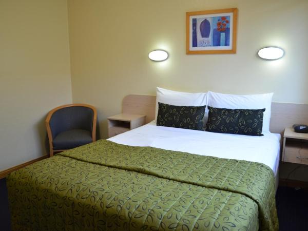 Airport Motel Brisbane : photo 3 de la chambre chambre standard lit queen-size