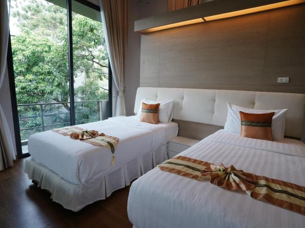 Tree Scape Retreat Resort : photo 1 de la chambre chambre deluxe double ou lits jumeaux