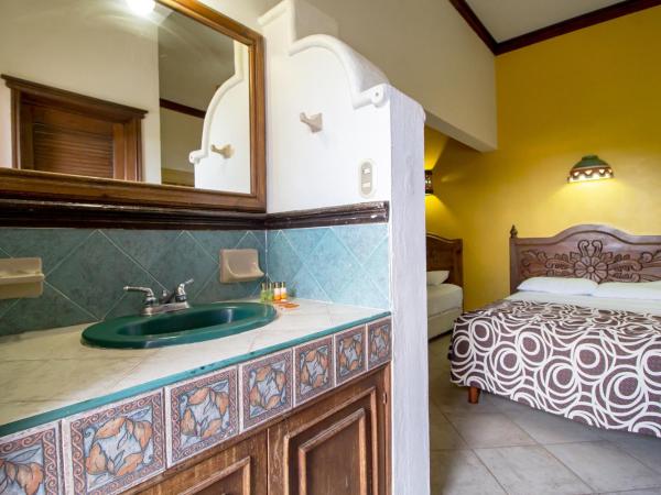 Suites Flamboyanes : photo 2 de la chambre chambre triple
