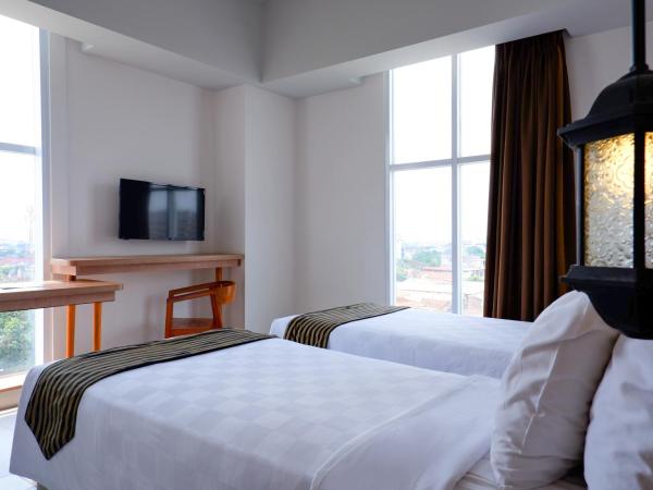 KHAS Tugu Hotel Yogyakarta : photo 2 de la chambre chambre lits jumeaux de luxe avec vue panoramique