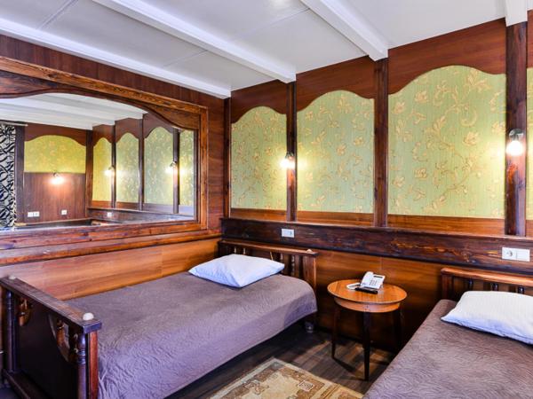 Dworek staropolski : photo 1 de la chambre chambre lits jumeaux spacieuse