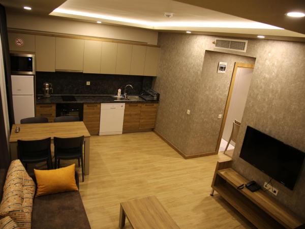 Golden World Suite Hotel : photo 7 de la chambre suite lit queen-size