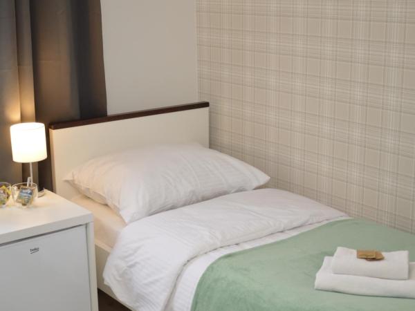 Cracow Central Aparthotel : photo 1 de la chambre chambre lits jumeaux Économique