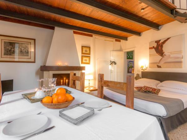 B&B Villa I 2 Leoni : photo 6 de la chambre suite en duplex - vue sur parc