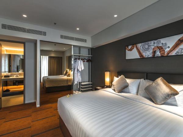 Oakwood Hotel & Residence Surabaya : photo 1 de la chambre hébergement 1 chambre premier