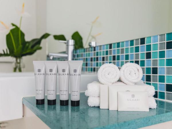 Silkari Lagoons Port Douglas : photo 5 de la chambre chambre d’hôtel avec baignoire spa