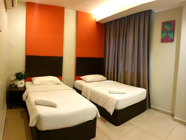 Golden Court Hotel - Tun Abdul Razak : photo 2 de la chambre chambre lits jumeaux standard