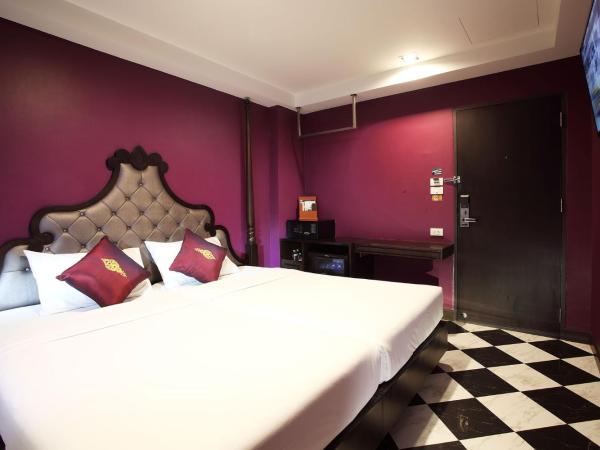 Violet Tower at Khaosan Palace : photo 3 de la chambre chambre lits jumeaux violette